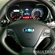 GALLERY: Kia Cerato at the showroom with brochure