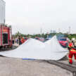 EV fire blanket demonstrated by Fire and Rescue department of Malaysia – suitable for most vehicles