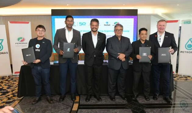 Perodua inks MoUs with Petronas on a variety of services, with Gentari on EV charging at its facilities