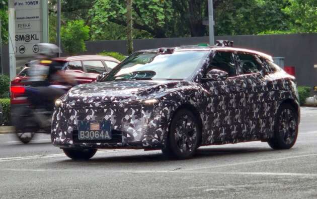 Perodua ‘QV-E’ EV spotted without rear wing, exposing sloping roofline, notched tailgate design, sporty profile