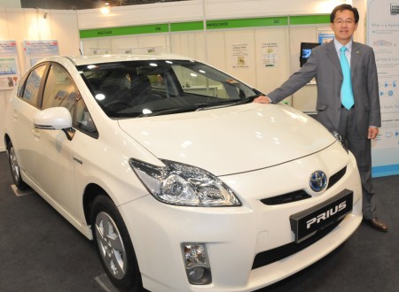 Mr Kuah Kock Heng photo with Toyota Prius-1 New Toyota Prius lowered price – RM139,900